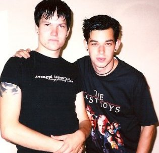 Podcast Hosts, Christopher Smith and Peter Sawyer, when they were young punk rockers (2001)